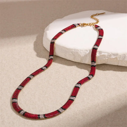 AFORIA™ SNAKE PRINT NECKLACES